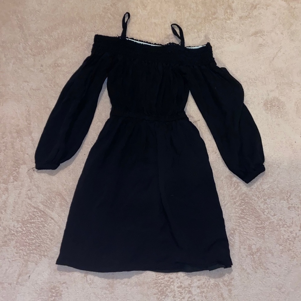 All black romper off the shoulders